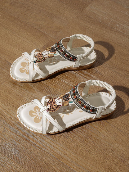 Sandalias planas: con soporte para el arco, para aliviar el dolor; ligeras y con amortiguación.
